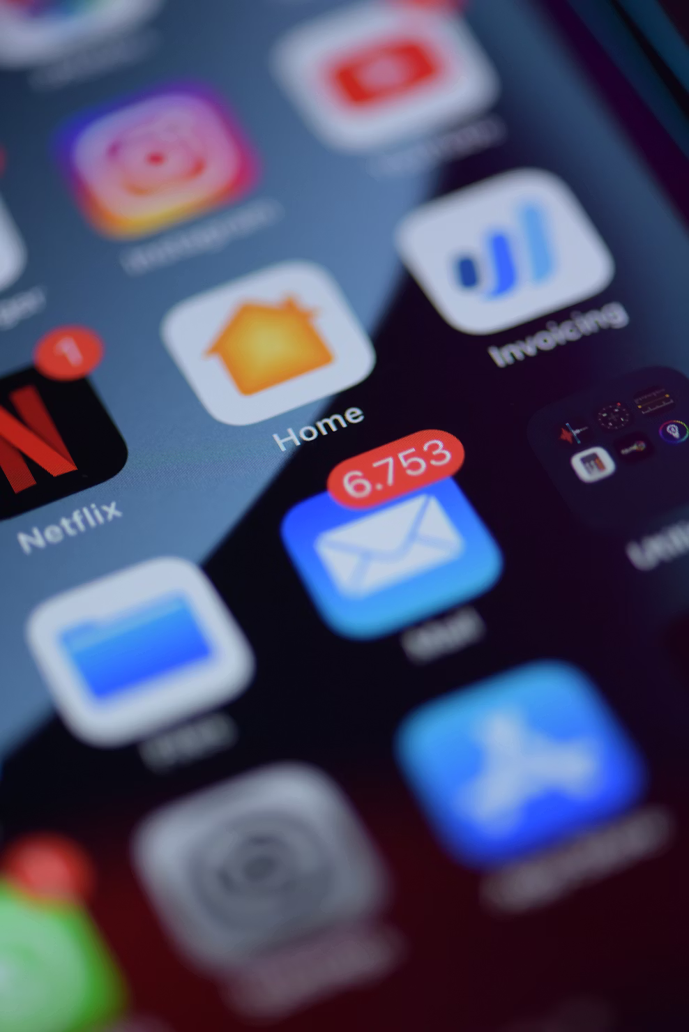 Business person checking email on mobile