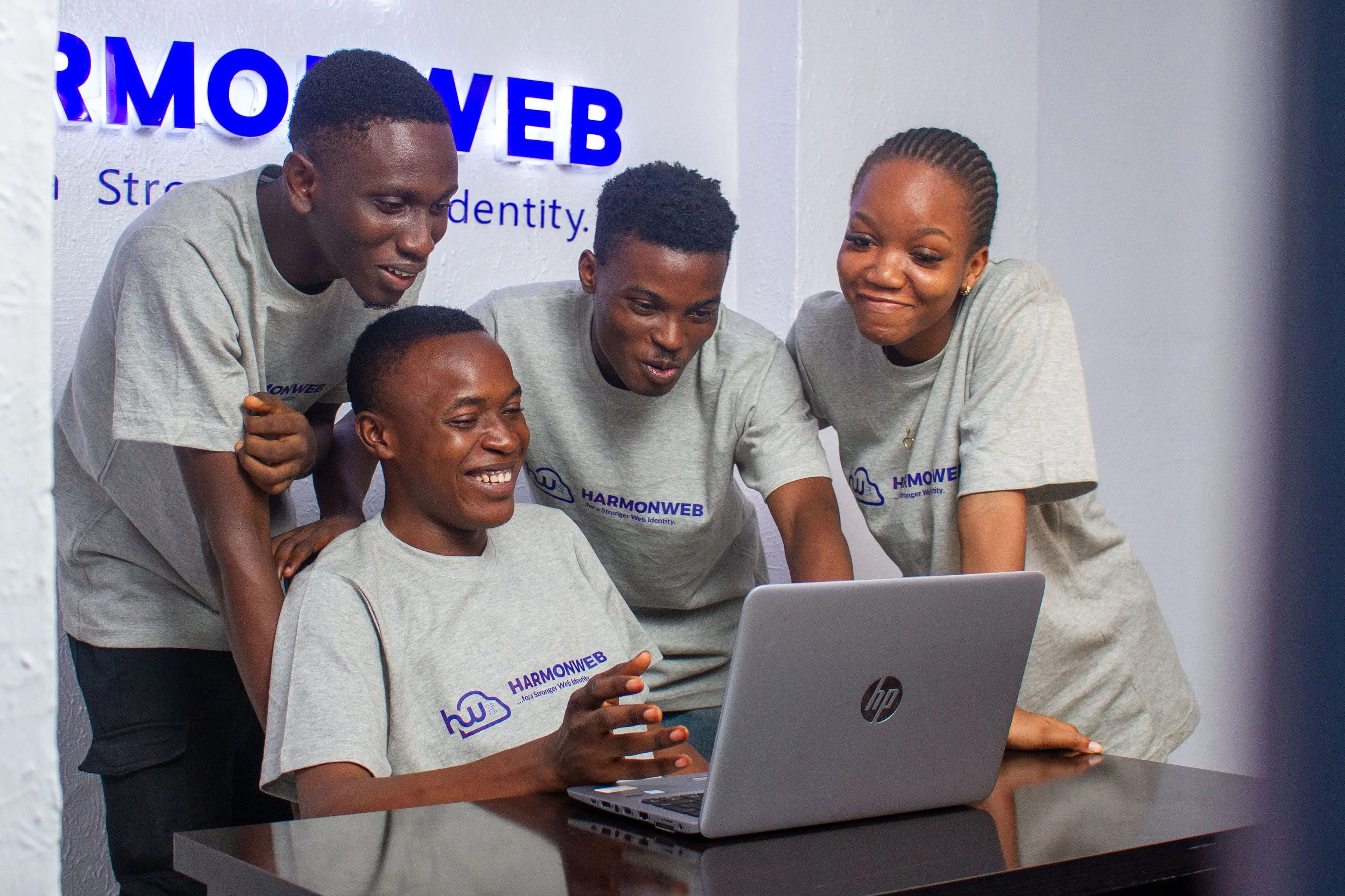 HarmonWeb team collaborating